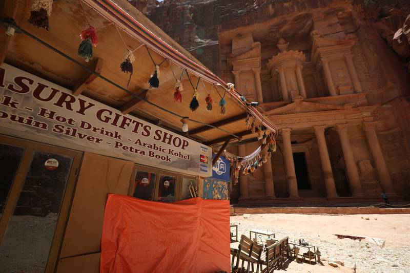 A closed souvenir shop in front of the treasury site in the ancient city of Petra is seen empty of tourists after the government closed all tourist facilities in the country amid concerns over the spread of the coronavirus in Jordan. Reuters
