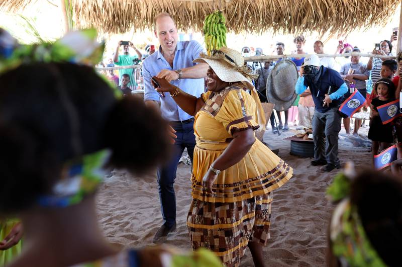 Prince William dances with the locals in Hopkins. Reuters