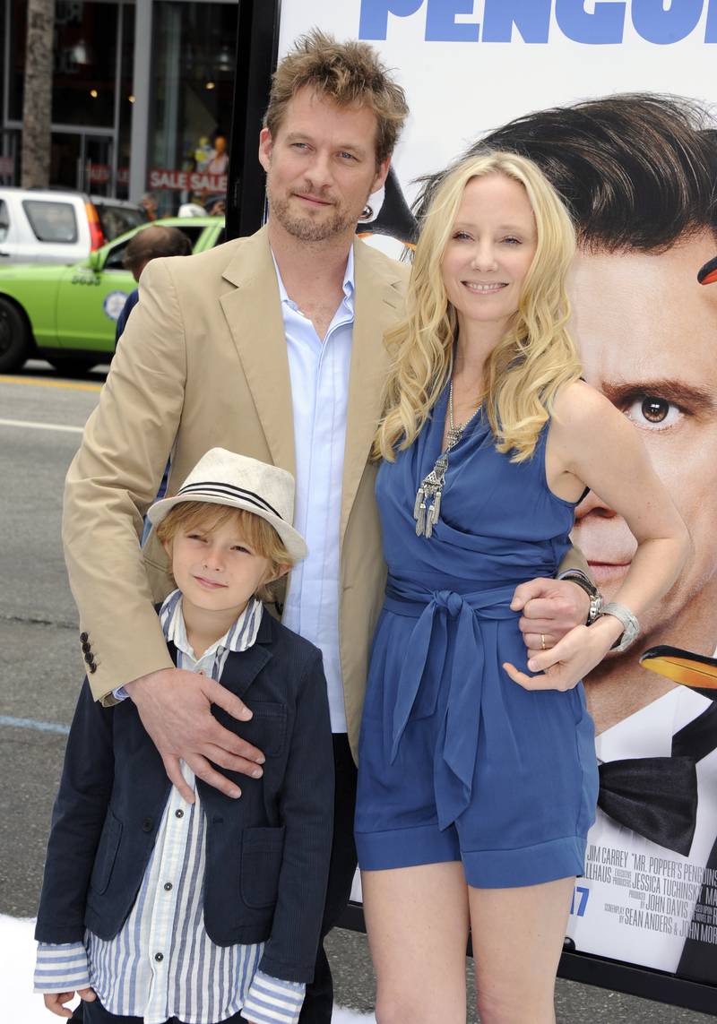Canadian actor James Tupper, left, Anne Heche, right, and son Atlas Heche Tupper at the premiere of 'Mr Popper's Penguins' in 2011. EPA