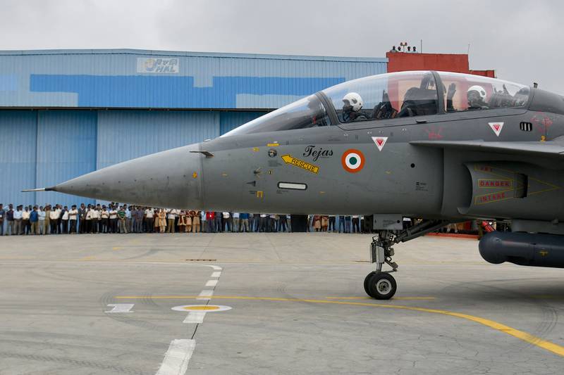 A Tejas jet carrying Indian Defence Minister Rajnath Singh taxis to the runway at HAL Airport in Bangalore.