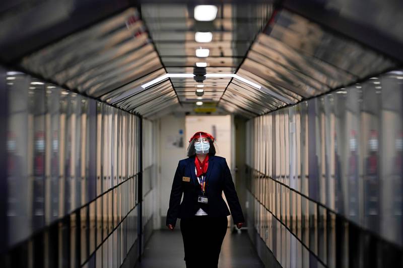 Front of House Visitor Host Jessica Baudet walks through the The Gladstone Link tunnel, between the Radcliffe Camera and Old Bodleian Library in Oxford, England.  Getty Images