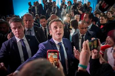 The French leader acknowledges his supporters at a rally in Paris. Getty Images