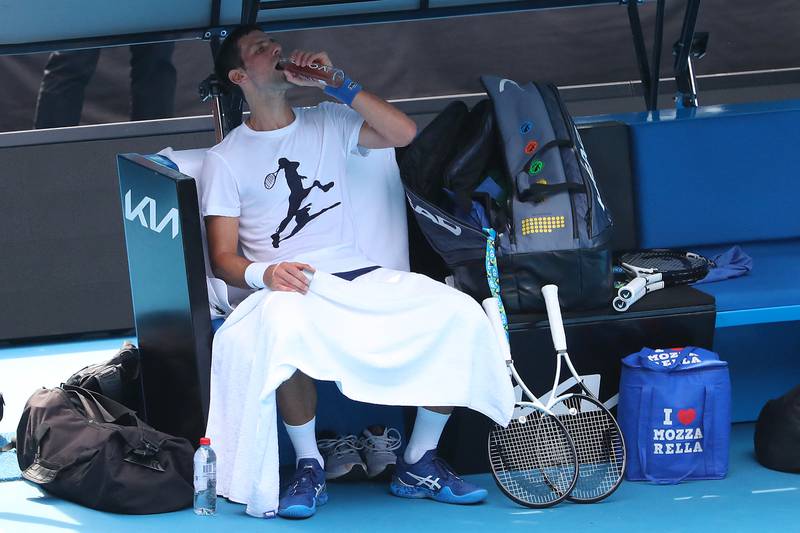 Serbia's Novak Djokovic takes on some fluids. AFP