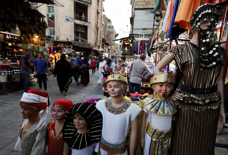 Shoppers walk through a market in Cairo. BNPL platform Tabby says it aims to help Egyptians to stay in control of their spending. Reuters