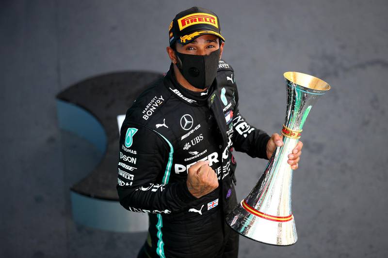 Lewis Hamilton celebrates on the podium after the Spanish Grand Prix. AFP