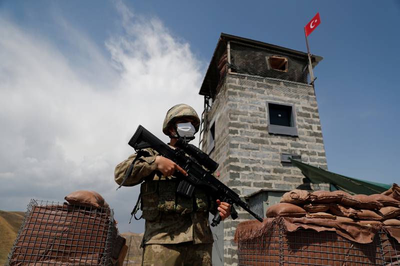 A Turkish soldier guards a military post on the Turkish-Iranian border in Van province, Turkey. Reuters