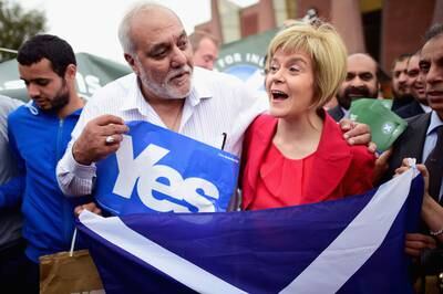 Then Scottish National Party deputy leader Ms Sturgeon meets worshippers at Glasgow Central Mosque during the 'Yes' campaign for the Scottish Referendum in September 2014. Getty