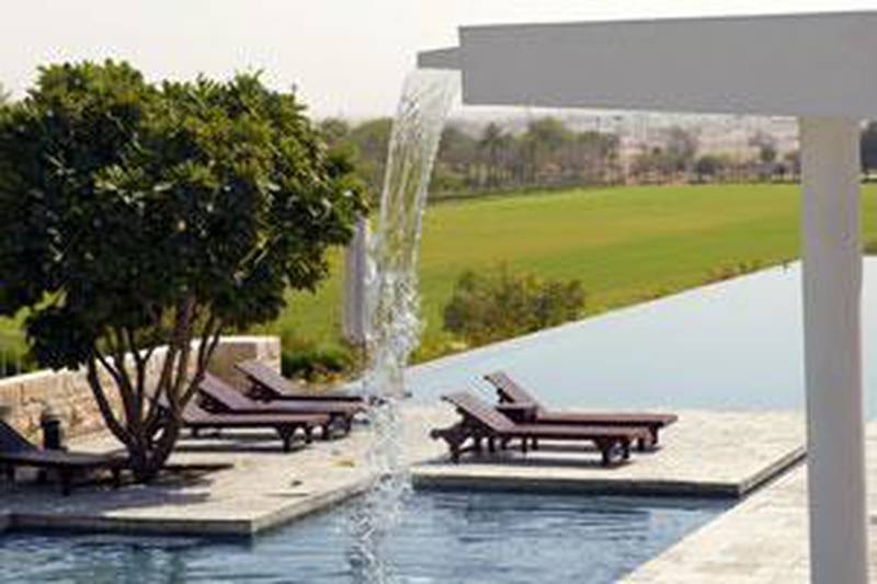A luxury villa at Dubai Desert Palm uses feel-good factors such as open space and light. .