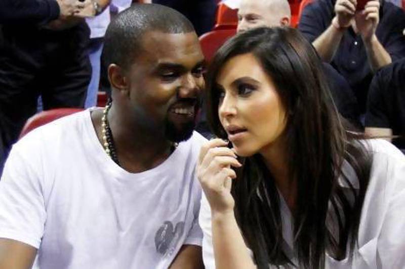 Kanye West and Kim Kardashian. Alan Diaz / AP Photo