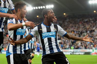 NEWCASTLE UPON TYNE, ENGLAND - SEPTEMBER 26:  Georginio Wijnaldum (R) of Newcastle United celebrates scoring his team's second goal with his team mate Ayoze Perez (L) during the Barclays Premier League match between Newcastle United and Chelsea at St James' Park on September 26, 2015 in Newcastle upon Tyne, United Kingdom.  (Photo by Tony Marshall/Getty Images)