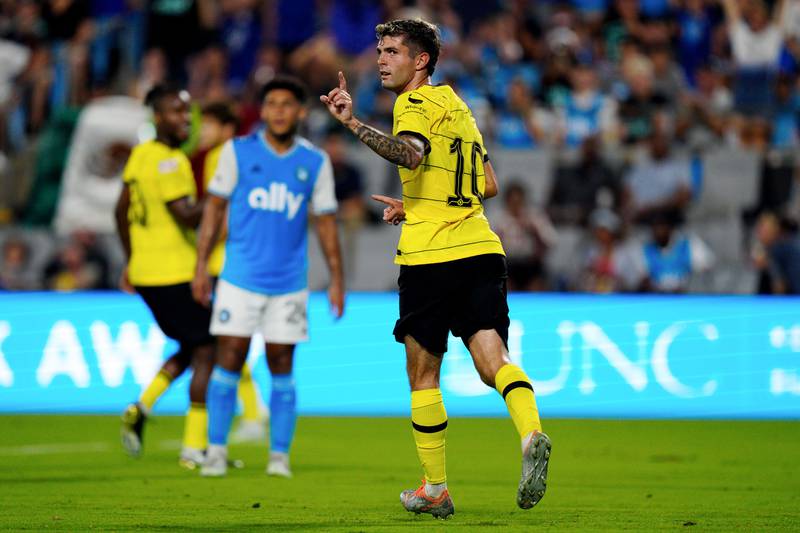 Chelsea winger Christian Pulisic celebrates after scoring the first goal. Getty