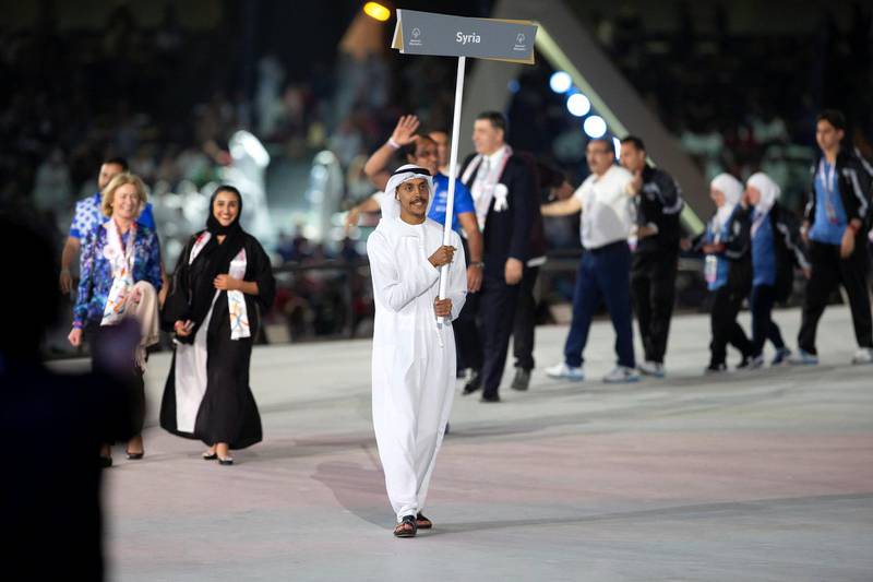 ABU DHABI, UNITED ARAB EMIRATES - March 14, 2019: Athletes from Syria participate in the opening ceremony of the Special Olympics World Games Abu Dhabi 2019, at Zayed Sports City. 

( Mohamed Al Baloushi for the Ministry of Presidential Affairs )
---