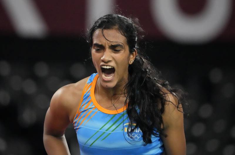 India's PV Sindhu celebrates after winning against He Bingjiao of China during their women's singles badminton bronze medal match.