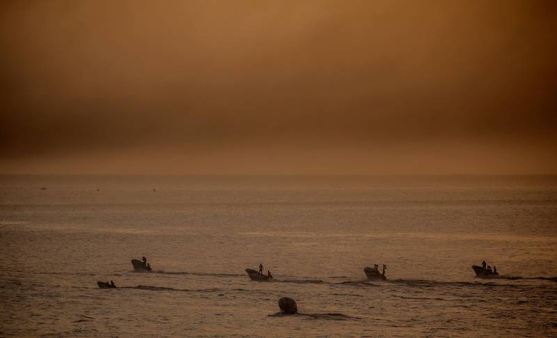 Protesters ride boats during clashes near the border between Israel and the Gaza Strip. EPA
