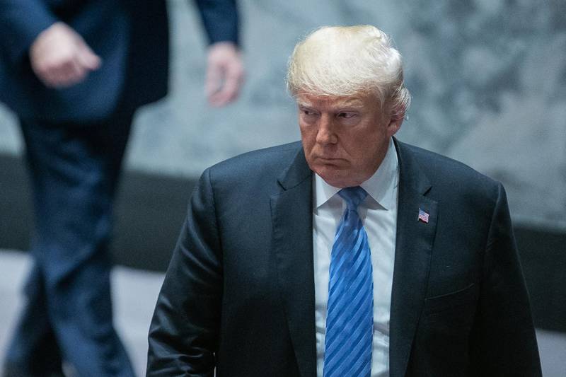 U.S. President Donald Trump leaves after a United Nations Security Council briefing in New York, U.S., on Wednesday, Sept. 26, 2018. Trump said that China is attempting to interfere in the 2018 midterm congressional elections and alleged Beijing seeks to help his opponents. Photographer: Jeenah Moon/Bloomberg