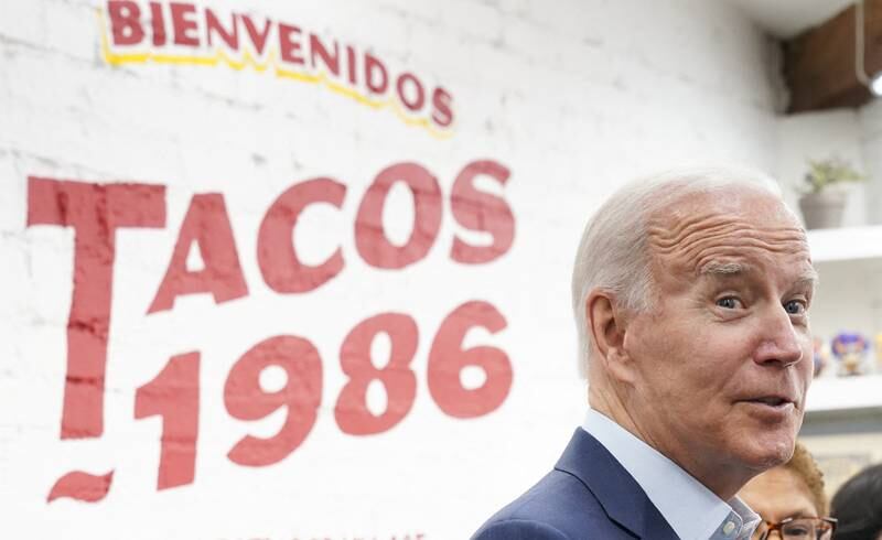 U. S.  President Joe Biden speaks to reporters during a visit to a taco shop in Los Angeles, California, U. S. , October 13, 2022.   REUTERS / Kevin Lamarque