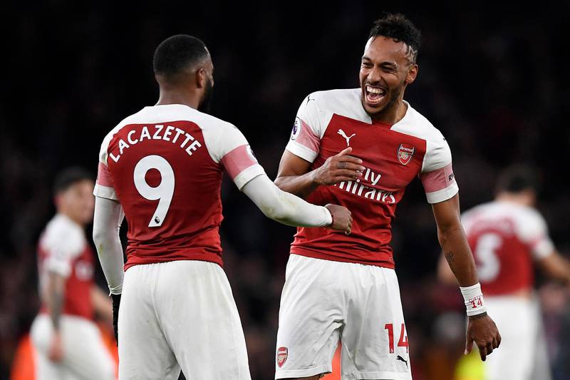 epaselect epa07203978 Arsenal's Pierre-Emerick Aubameyang (R) celebrates with team mate Alexandre Lacazette (L) at the end of the English Premier League soccer match between Arsenal and Tottenham at the Emirates Stadium, London, Britain, 2 December 2018.  EPA/WILL OLIVER EDITORIAL USE ONLY. No use with unauthorized audio, video, data, fixture lists, club/league logos or 'live' services. Online in-match use limited to 75 images, no video emulation. No use in betting, games or single club/league/player publications
