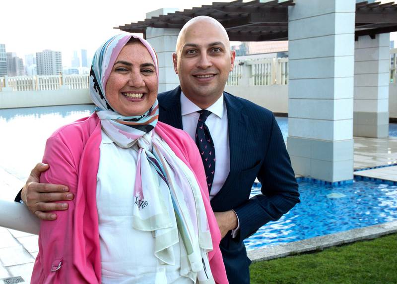 Abu Dhabi, United Arab Emirates, October  13, 2020.  Breast cancer survivor Dr. Radwa Helal and husband, Dr. Khaled Omar. Victor Besa/The NationalSection:  NAReporter:  Haneen Dajani