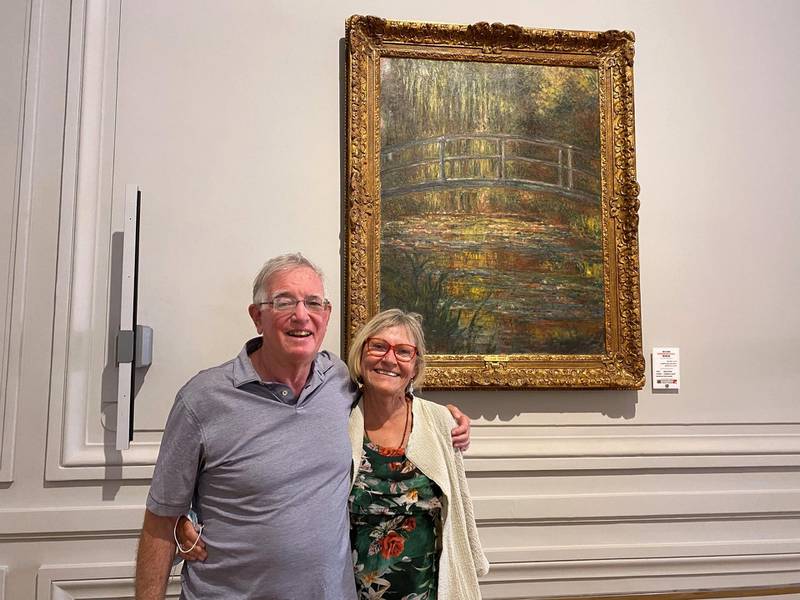 American visitors Phillip Margolin and Melanie Nelson in front of Claude Monet's A Bridge on a Pond. Nada El Sawy / The National