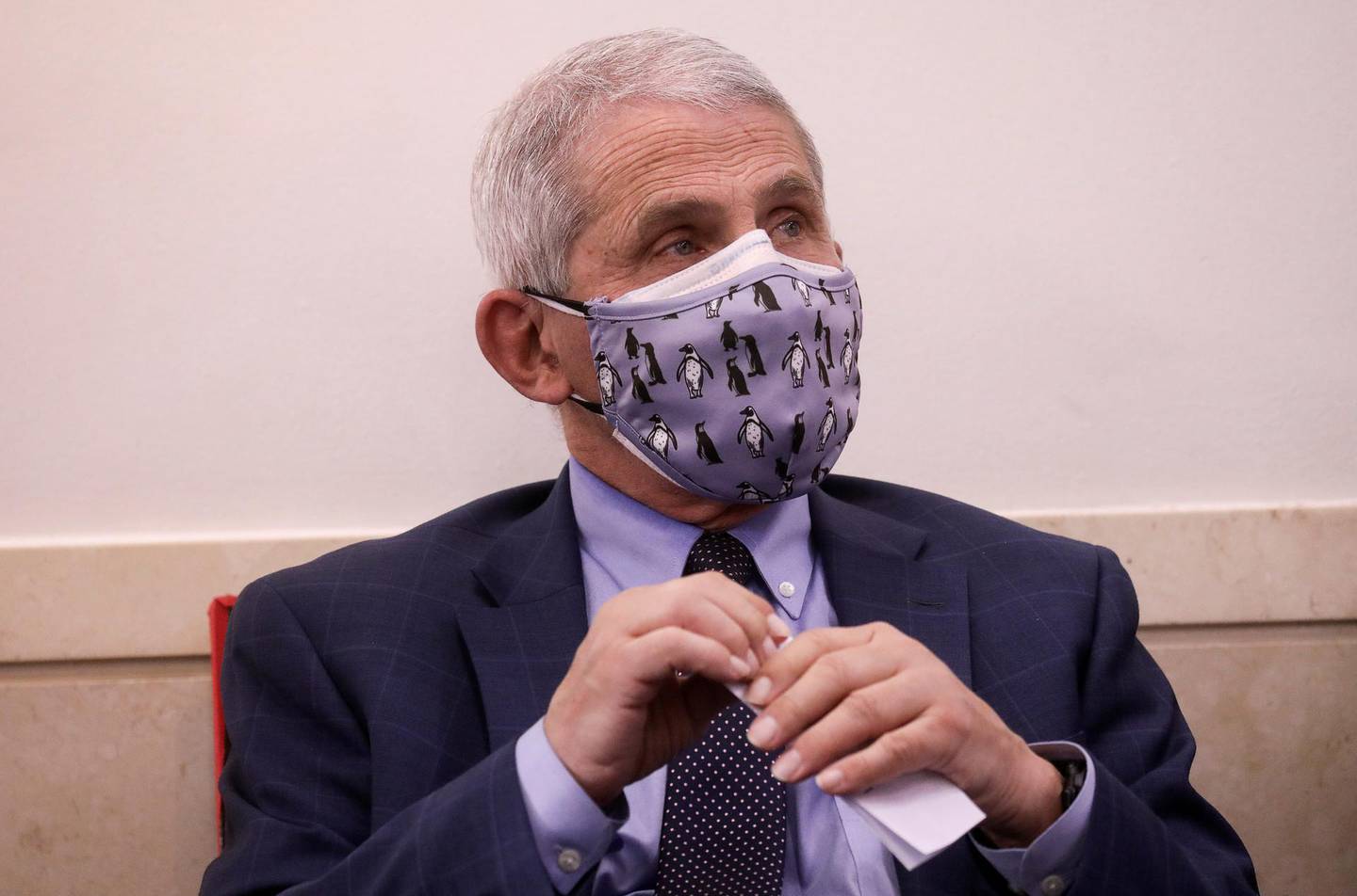 FILE PHOTO: Dr. Anthony Fauci, director of the National Institute of Allergy and Infectious Diseases, attends a briefing by the White House coronavirus task force in the Brady press briefing room at the White House in Washington, U.S., November 19, 2020. REUTERS/Leah Millis/File Photo