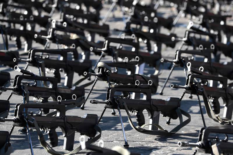 Rifles are laid out in preparation for the annual Bastille Day military parade. Joel Saget / AFP Photo