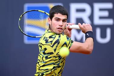 ROME, ITALY - MAY 13: Carlos Alcaraz of Spain plays a backhand during their singles second round match against Albert Ramos-Vinolas of Spain during day six of the Internazionali BNL D'Italia at Foro Italico on May 13, 2023 in Rome, Italy. (Photo by Justin Setterfield / Getty Images)
