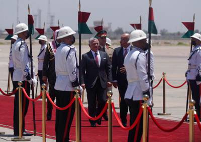 Iraqi President Barham Salih receives Jordanian King Abdullah II at Baghdad Airport. AFP