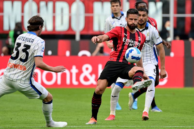 AC Milan forward Olivier Giroud controls the ball. AFP