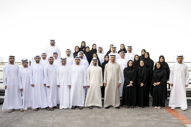 Sheikh Mohamed with Sheikh Khalifa bin Tahnoon and members of the martyr's office at the Sea Palace.