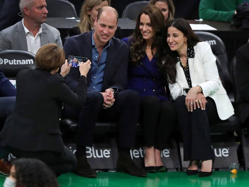 Massachusetts governor-elect Maura Healey takes a photo of the Prince and Princess of Wales with Emilia Fazzalari, wife of Boston Celtics owner Wyc Grousbeck at an NBA game. Reuters