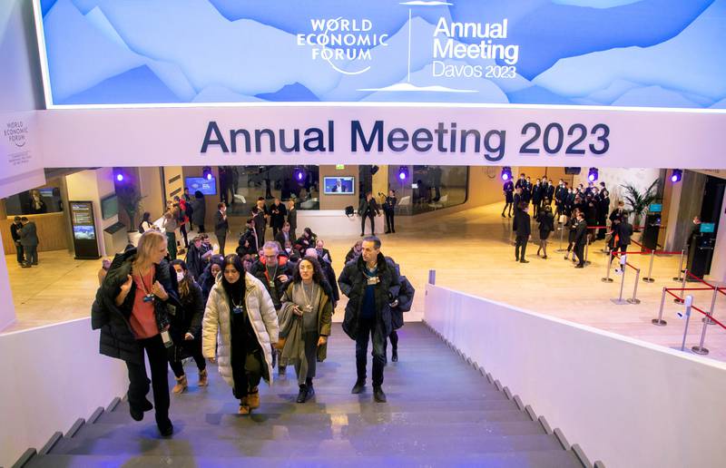 World Economic Forum delegates arrive at the Davos Congress Centre in Switzerland, on Monday. Reuters