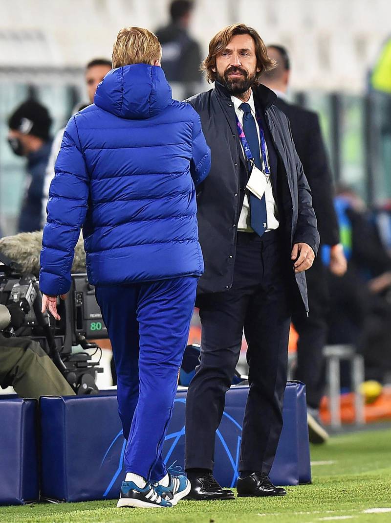 Juventus' head coach Andrea Pirlo greets Barcelona's coach Ronald Koeman. EPA