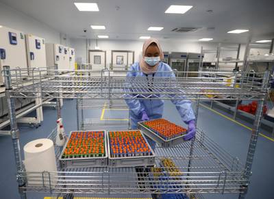 A lab technician works at the Amazon Covid-19 testing lab in Worsley. Reuters