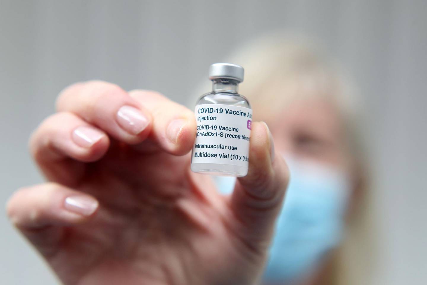 A vial of the AstraZeneca/Oxford Covid-19 vaccine is held at the Pontcae Medical Practice in Merthyr Tydfil in south Wales on January 4, 2021. Britain on Monday began rolling out the Oxford-AstraZeneca coronavirus vaccine, a possible game-changer in fighting the disease worldwide. / AFP / Geoff Caddick
