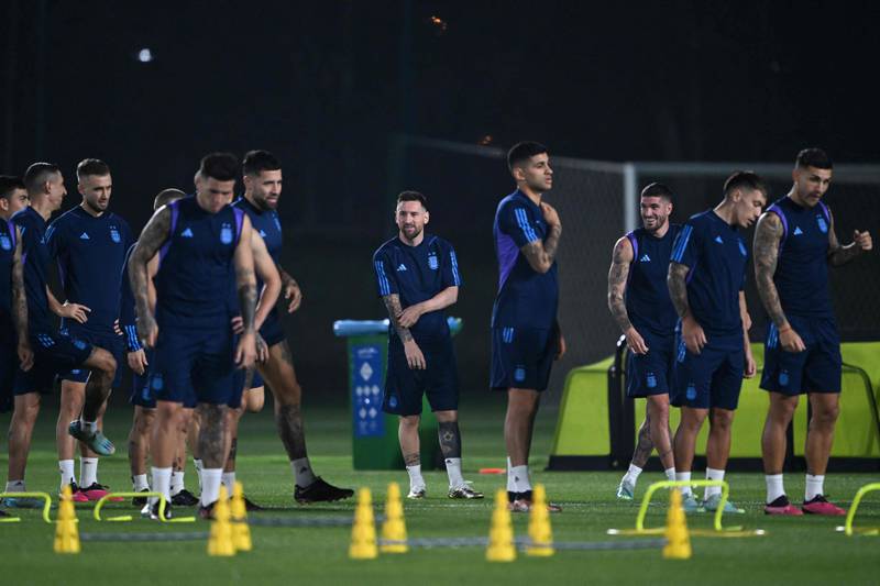 Lionel Messi and his teammates take part in a training session at Qatar University. AFP