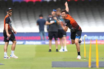 LONDON, ENGLAND - JULY 13: Trent Boult of New Zealand bowling as captain Kane Williamson (l) looks on prior to the Final of the ICC Cricket World Cup 2019 between England and New Zealand at Lord's Cricket Ground on July 13, 2019 in London, England. (Photo by Michael Steele/Getty Images)