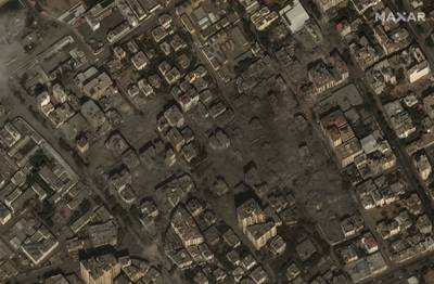 Destroyed residential buildings in Gaza City. AP
