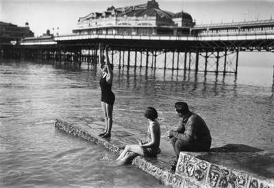 A girl prepares to take the plunge in Brighton in 1929.
