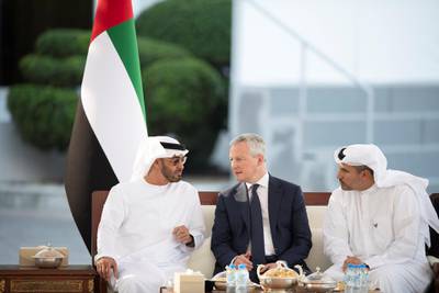 ABU DHABI, UNITED ARAB EMIRATES - February 24, 2020: HH Sheikh Mohamed bin Zayed Al Nahyan, Crown Prince of Abu Dhabi and Deputy Supreme Commander of the UAE Armed Forces (L) receives HE Bruno Le Maire, Minster of Economy and Finance of France (C), during a Sea Palace barza. Seen with HE Khaldoon Khalifa Al Mubarak, CEO and Managing Director Mubadala, Chairman of the Abu Dhabi Executive Affairs Authority and Abu Dhabi Executive Council Member (R). 

( Saeed Al Mehairi / Ministry of Presidential Affairs )
---