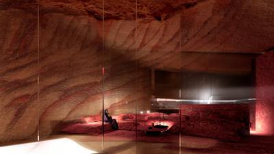 The site’s dramatic rock faces are a central focus of the design, as seen in this guest room. Courtesy Jean Nouvel