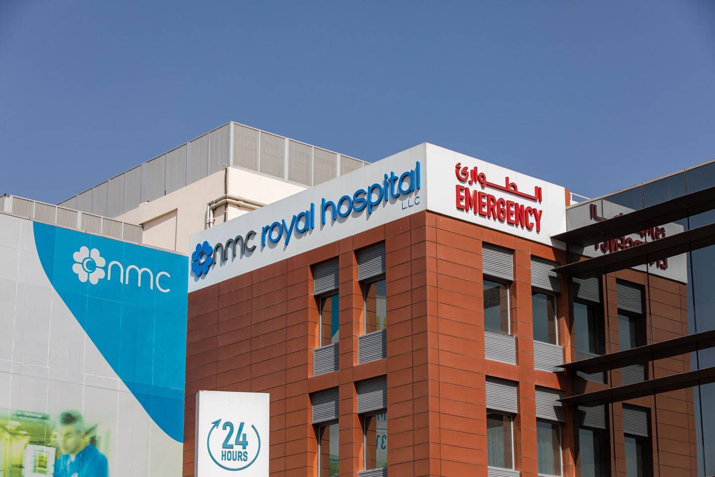 An emergency department sign sits on display outside the NMC Royal Hospital, operated by NMC Health Plc, in Abu Dhabi, United Arab Emirates, on Sunday, March 1, 2020. Troubled NMC Health Plc, the largest private health-care provider in the United Arab Emirates, asked lenders for an informal standstill on its debt as Abu Dhabi weighs an injection of capital to safeguard the emirate’s reputation among global investors. Photographer: Christopher Pike/Bloomberg