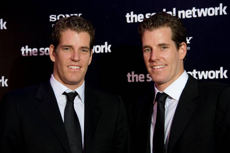 Tyler Winkelvoss and Cameron Winkelvoss attend the premiere of "The Social Network" in Paris. (Photo by Stephane Cardinale/Corbis via Getty Images)