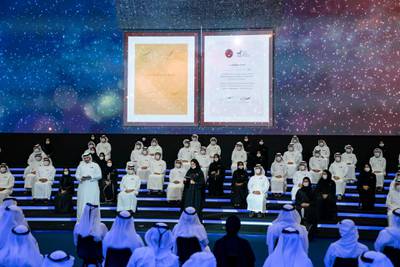 ABU DHABI, UNITED ARAB EMIRATES - July 31, 2020: Fatima Al Bannai (on stage - centre R) and Saeed Al Gergawi (on stage - centre L) present during a ceremony to honour the Hope Probe team, at Qasr Al Watan. 

( Hamad Al Mansoori for the Ministry of Presidential Affairs )
---