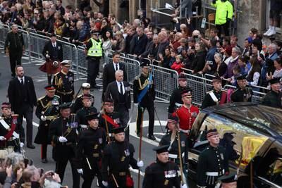 King Charles, Princess Anne, Prince Andrew and Prince Edward follow the hearse carrying the coffin of their mother, Queen Elizabeth, on the Royal Mile in Edinburgh. Reuters