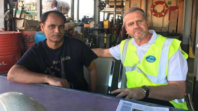Reverend Andy Bowerman, right, has helped scores of seafarers who have been abandoned by their employers during the Covid-19 pandemic. His role at the Mission to Seafarers involves ensuring medical help, food supplies and fuel is available to forgotten merchant sailors. The National