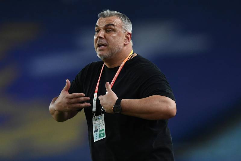 Head coach Cosmin Olaroiu of Jiangsu Suning reacts as he watches his players competing against Henan Jianye in their 22nd round match during the 2019 Chinese Football Association Super League (CSL) in Nanjing city, east China's Jiangsu province, 13 August 2019.Jiangsu Suning defeated Henan Jianye 3-0.No Use China. No Use France. Reuters
