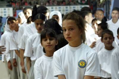 Princess Iman, centre, looks on during the King Abdullah II award ceremony for physical fitness in 2008. Getty Images