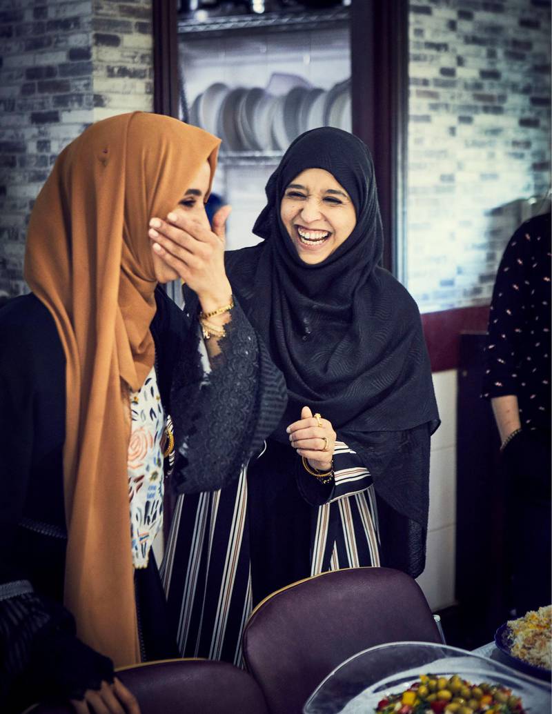 Halima Al-huthaifi and Zahira Ghaswala cook in the Hubb Community Kitchen Reuters