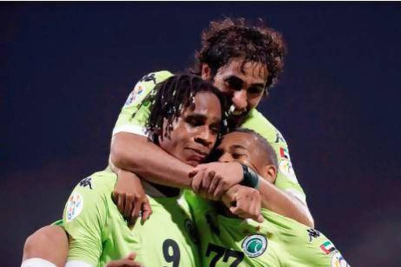 Edgar Bruno, left, celebrates with his Al Shabab teammates after scoring a goal against Lekhwiya during their Asian Champions League football match.