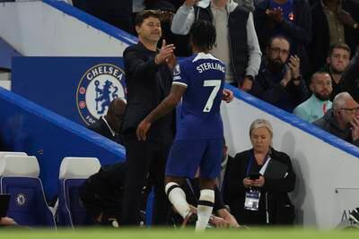 Chelsea's Raheem Sterling with manager Mauricio Pochettino after being subsituted. AP
